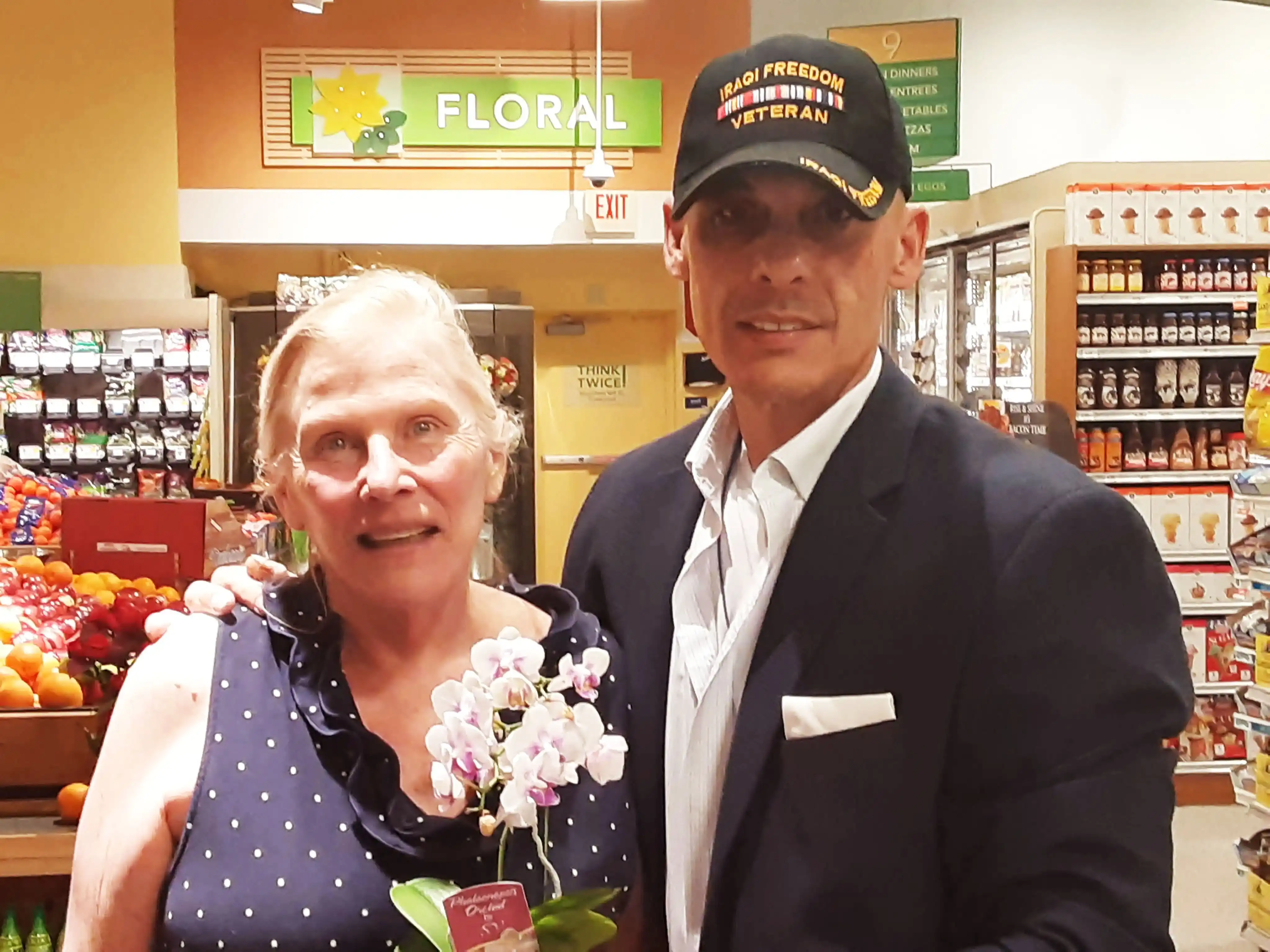 The love for the Country grows more in the Veteran Heart of David Haave; picking out orchids for a nurse's and front liner ceremony, Florida, USA. -- David Haave